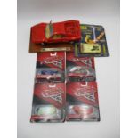 An unboxed Burago Ferrari GTO (1984) model car, along with four boxed Disney Pixar Cars including