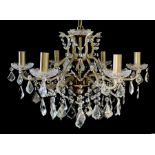 A vintage six branch chandelier with glass swags and drops.