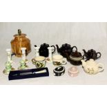 A collection of china including Limoges candle sticks, Wedgwood, various tea pots and a pottery lamp