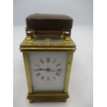 A brass carriage clock in carry case A/F