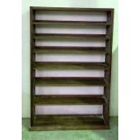A large freestanding oak bookcase - height 200cm, width 128cm, depth 29cm