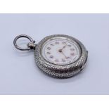 A silver fob watch with ornate enamelled dial- watchmakers label to inside- Daniel Thompson,