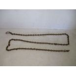 A vintage cast iron link chain