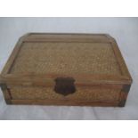 A vintage box with sloped hinged top