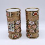 A pair of 19th Century Spode Imari patterned cylindrical vases, pattern number 1227