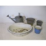 A galvanised watering can and two buckets, along with an enamelled bowl etc