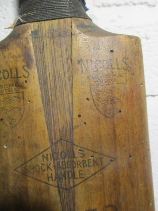 Two vintage cricket bats one is marked Nicolls and stamped J F Anderson, the other is a Gradidge, - Image 10 of 10