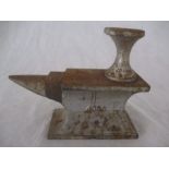 A 20th century cast iron miniature cobbler's anvil by Harper, numbered 4006, together with a