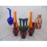 A collection of various coloured glass vases etc.