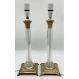 A pair of art deco style modern lamps with gilt decoration