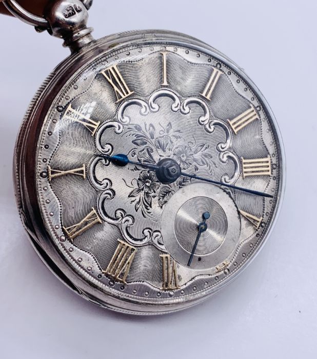 A hallmarked silver pocket watch with fusee movement. The chased silver dial with subsidiary - Image 2 of 4