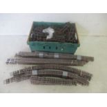 A collection of antique two and three rail model railway track