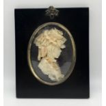 A miniature wax relief by Leslie Ray