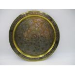 An Eastern tray with silver inlay - diameter 34cm