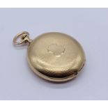 A 14ct gold hunter fob watch the enamelled dial marked Salter- winder loose but working