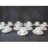 A 13 place tea set by Tuscan China, pattern number 9143