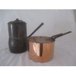 An antique copper saucepan and lid along with a no. 27 cast iron saucepan by Kenrick with extra