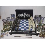 A boxed DeAgostini Harry Potter Chess set including two character sets, chess board, wands, boxed