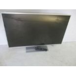 A Panasonic 42 inch TV with remote