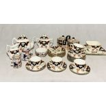 A collection of Imari style patterned part tea sets