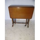 A Sutherland drop leaf table, height 57cm, 68cm x 54cm