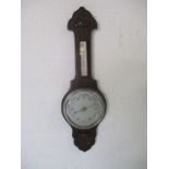 A wall hanging Aneroid Barometer