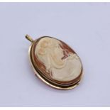 A cameo brooch /pendant set in gold ( possibly 14ct)