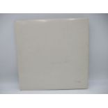 The Beatles - White Album 12" vinyl (1968 stereo), numbered 248528, complete with all four photos of