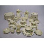 An Art Deco Royal Doulton "Minden" design part tea set including coffee pot (A/F), various plates,