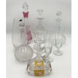 A collection of various glassware including a bohemian cranberry glass decanter, Dartington
