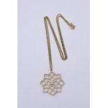 An Ola Gorie 9ct gold lotus flower shaped pendant and chain, weight 4.9g