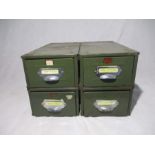 A set of four Veteran Series metal vintage filing drawers