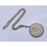 A 1937 Crown in silver mount on a 925 silver chain- total weight 54.8g