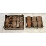 A collection of small terracotta pots