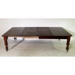 A Victorian mahogany pull out dining table with two leaves - length 268cm, width 136cm, height 75cm