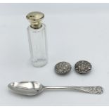 A pair of silver cuff button covers, a silver gilt topped perfume bottle and a silver Georgian