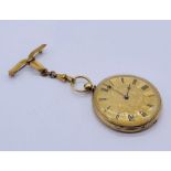 A Racine gold watch with engraved picture back, chased decoration to dial. Unmarked gold fob.