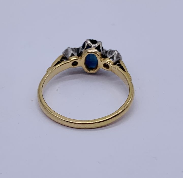 An 18ct gold and platinum sapphire and diamond three stone ring - Image 3 of 3