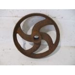 A small cast iron wheel - diameter 30cm