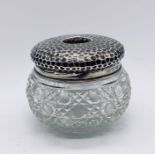 A hallmarked silver and cut glass dressing table pot