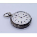 A continental 935 silver fob watch with enamelled dial