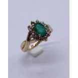 A 9ct gold emerald cluster ring