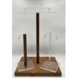 Three wood and perspex shop display stands