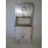 A vintage aluminium kitchen cupboard.