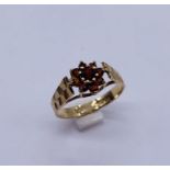 A 9ct gold garnet cluster ring