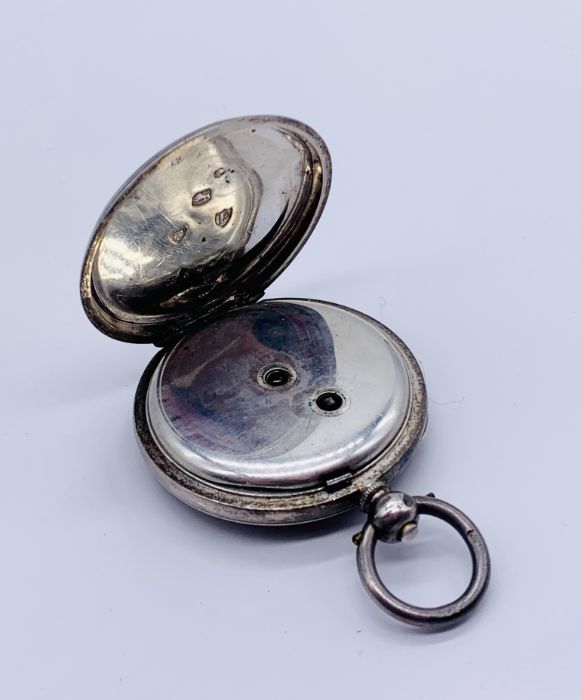 A hallmarked silver fob watch with silvered dial with gold detailing - Image 4 of 4