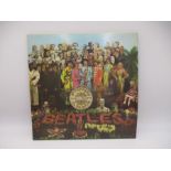 The Beatles - Sgt. Peppers Lonely Hearts Club Band 12" vinyl album, 1967 Mono 1st press with red