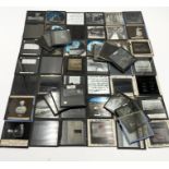 Approximately 50 vintage magic lantern slides