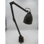 A vintage industrial machinists Memlite angle poise lamp.