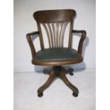 A W.B Limited oak swivel office chair (one foot missing)